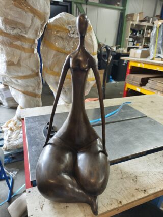 Bronze statue of a seated lady 60 cm