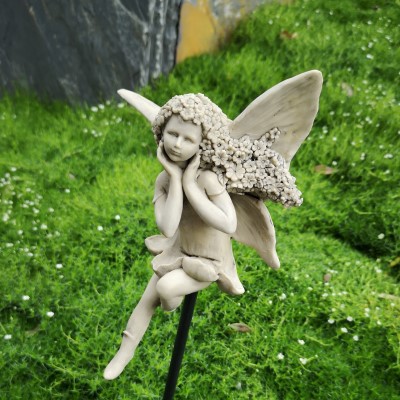 Tuinsteker Bloemenelfje hand onder hoofd 75cm