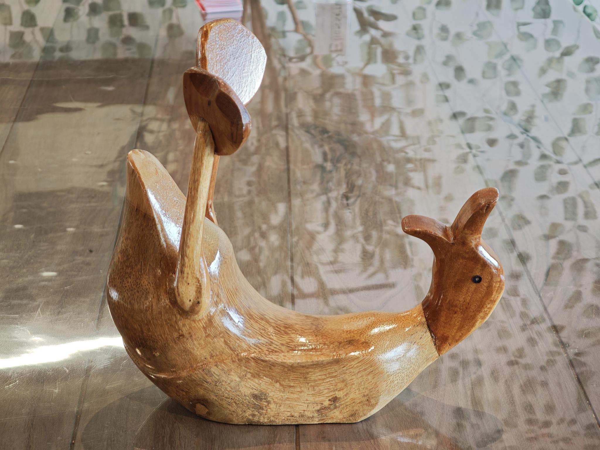 Holzstatue betrunkene Ente liegend 34cm eliassen.nl